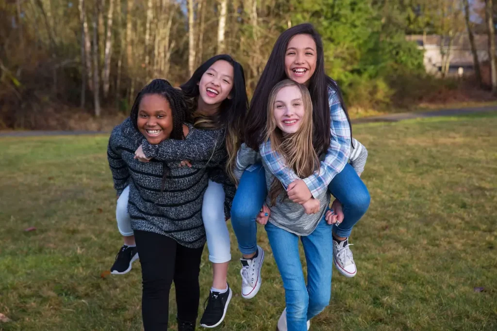 Children in a group practicing their social skills