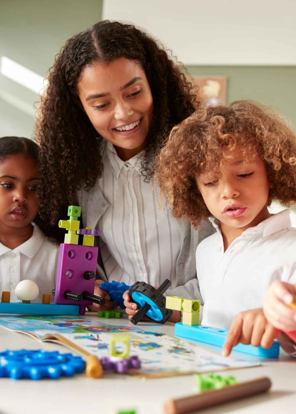 Therapist supporting children affected by childhood trauma