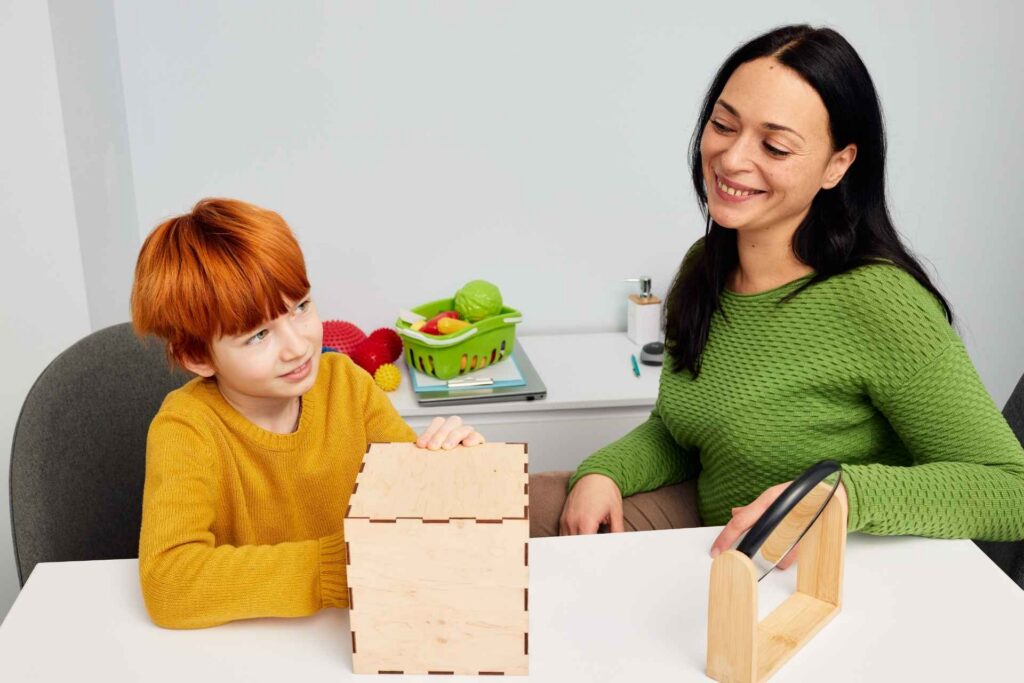 Child participating in an in-home ABA therapy session with a therapist